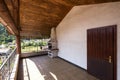 Terrace with wooden ceiling and tiles, landscape and hills