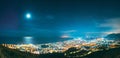 Terracina, Italy. Amazing Bright Blue Night Starry Sky With Full Moon Above Latina Province. Top View Skyline Cityscape Royalty Free Stock Photo