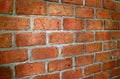 Terracotta brick wall in diminishing perspective view, for background Royalty Free Stock Photo