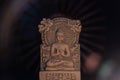 Terracotta Buddha of Sarnath, Varanasi, India in meditative peaceful ray of light