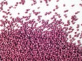 Terracotta colored masterbatch granules Royalty Free Stock Photo