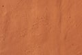 Terracotta painted stucco wall. Background texture Royalty Free Stock Photo