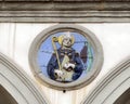 Terracotta relief of a Franciscan saint by Andrea della Robbia in a spandrel of the Hospital of San Paolo in Florence, Italy. Royalty Free Stock Photo