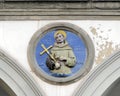 Terracotta relief of a Franciscan saint by Andrea della Robbia in a spandrel of the Hospital of San Paolo in Florence, Italy. Royalty Free Stock Photo