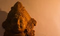 terracotta sculpture of face of goddess Durga for Durga Puja festival in west bengal india. shot against white background in