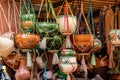 Terracotta pots and pans hanging in a shop in Cuenca, Ecuador