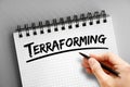 Terraforming text on notepad, concept background Royalty Free Stock Photo