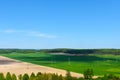 Terrain farm field, harvest, meadow, summer, power lines Royalty Free Stock Photo