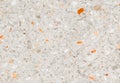 Terrazzo flooring which has Orange rock Small or marble old. polished stone wall beautiful texture for background Royalty Free Stock Photo