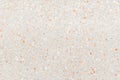 Terrazzo flooring which has Orange rock Small or marble old. polished stone wall beautiful texture for background