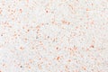 Terrazzo flooring which has Orange rock Small or marble old. polished stone wall beautiful texture Royalty Free Stock Photo