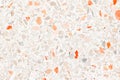 Terrazzo flooring which has Orange rock Small or marble old. polished stone wall beautiful texture Royalty Free Stock Photo