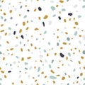 Terrazzo texture or tile. Seamless pattern with blue, yellow and black mineral rock crumb scattered on white background