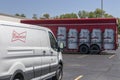 Budweiser distribution trucks. Budweiser is part of AB InBev, the largest beer company in the world