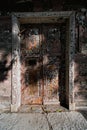 Terrible decrepit wooden door