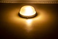 A Terrible light on the wall. The old lamp on the wall with yellow light Royalty Free Stock Photo