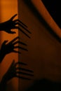 Terrible Shadows. Abstract Background. Black Shadows Of A Big Hands On The Wall. Royalty Free Stock Photo