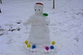 A terrible and ugly snowman made by children in the winter Royalty Free Stock Photo