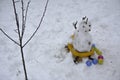 A terrible ugly snowman sculpted from the snow Royalty Free Stock Photo