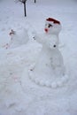 A terrible ugly snowman sculpted from the snow by children Royalty Free Stock Photo