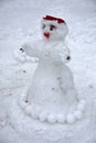 A terrible ugly snowman sculpted from the snow by children Royalty Free Stock Photo