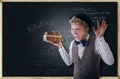 Terribly screaming student with books Royalty Free Stock Photo