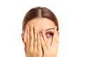 Terrified woman covering her face Royalty Free Stock Photo