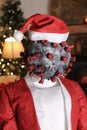 Terrifying Santa clause with spooky virus face