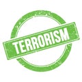 TERRORISM text on green grungy round stamp