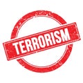 TERRORISM text on red grungy round stamp