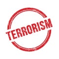 TERRORISM text written on red grungy round stamp