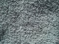 Terry cloth is gray. A sock turned inside out. Close-up. Soft, fluffy, fleecy, warm material for sewing clothes, towels, rugs.