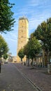 Vertical shot of the street of the Brandaris lighthouse at West Terschelling in Netherlands Royalty Free Stock Photo