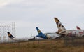 Teruel, EspaÃÂ±a-25 de agosto de 2022: Aviones en desguace de aviÃÂ³n en pista cerca de valla metalica