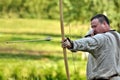 TERVETE, LATVIA - AUGUST 13, 2011: Historical Zemgalu days. Unknown archer demonstrate his skill