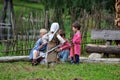 TERVETE, LATVIA - AUGUST 13, 2011: Historical Zemgalu days. Unknown children in ancient clothing with ancient weapons into groups