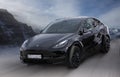 Tesla black electric car.