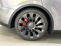 Tesla car model Y wheel, liquid silver dubbed Mercury Silver Metallic color, electric vehicle in showroomr, alternative energy