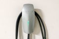 Tesla electric vehicle charging station.Tesla home charger station. Alternative energy