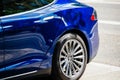 Tesla Model S 90D electric supercar parked in city