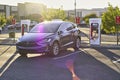 Tesla Model X charging at a Supercharger Royalty Free Stock Photo