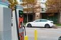 Tesla Parks next to a Chargepoint Public Charging Station