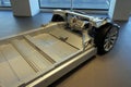 Tesla plug-in electric car chassis and battery