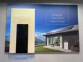 The Tesla Powerwall and Solar Sign at the entrance of the Tesla dealership in Orlando, FL