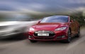 Tesla red car. Royalty Free Stock Photo