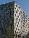 Tessellated facade of Ravensbourne campus building, a university college for digital media and design next to the O2 Arena.