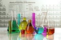 Test glass flasks and tubes with colored solutions on the period Royalty Free Stock Photo