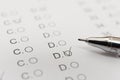 Test score sheet with answers and ballpoint Royalty Free Stock Photo