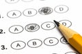 Test score sheet with answers and pencil . Closeup Royalty Free Stock Photo