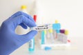 Test tube with covid-19 coronavirus flu vaccine